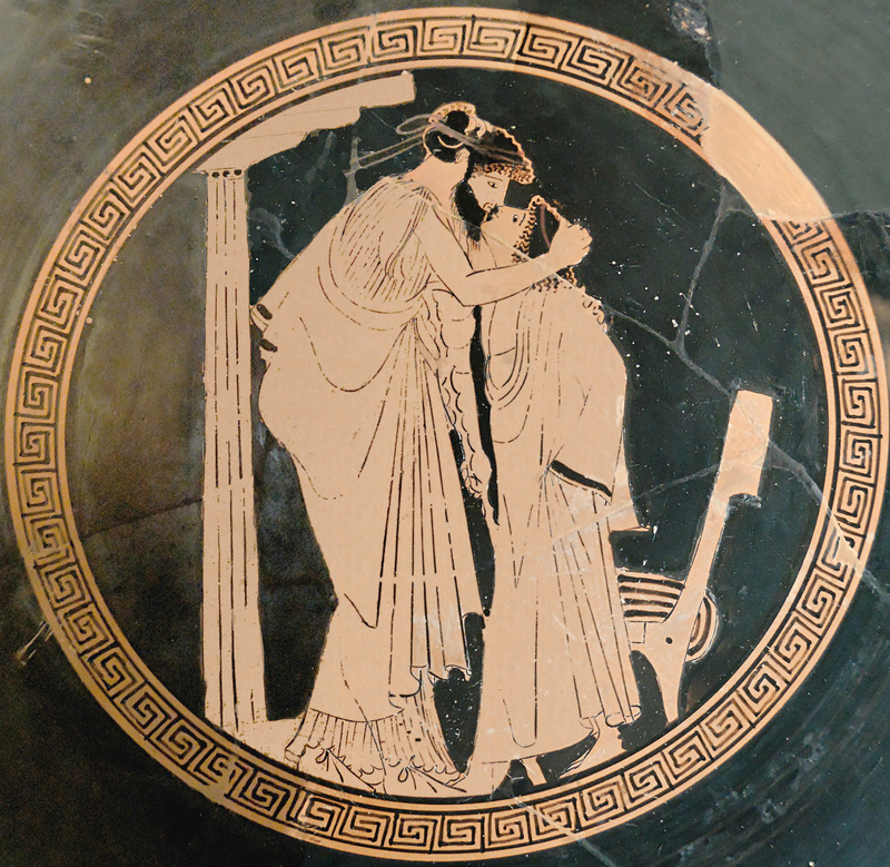 An image on an ancient Greek drinking cup of two lovers kissing. c.a. 480 BC. An image on an ancient Greek drinking cup of two lovers kissing. c.a. 480 BC.